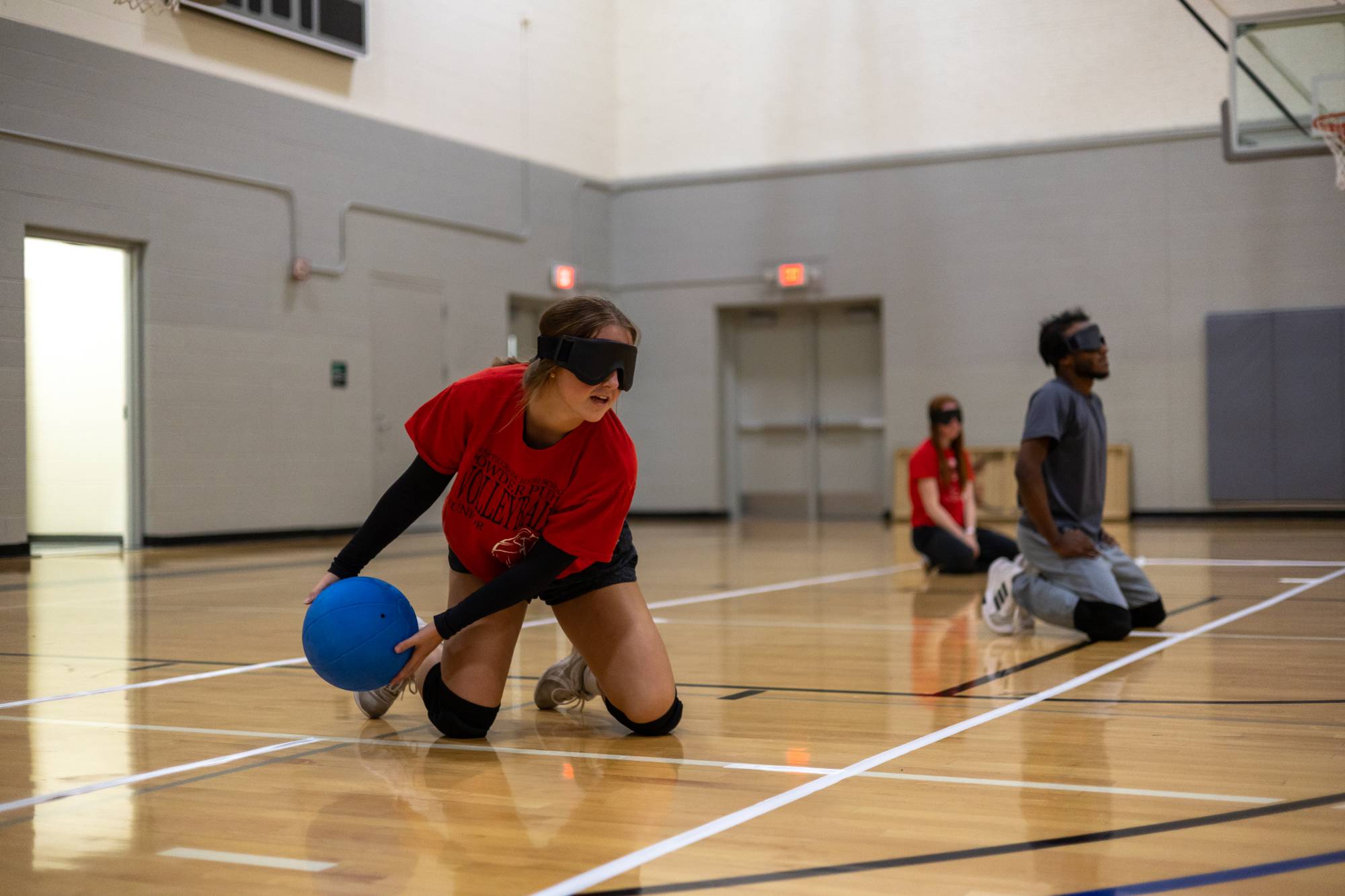 Student playing goalball at an adaptive intramural sports event